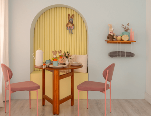 presentes de páscoa de mesa posta completa com adornos de páscoa nas paredes e nas estantes