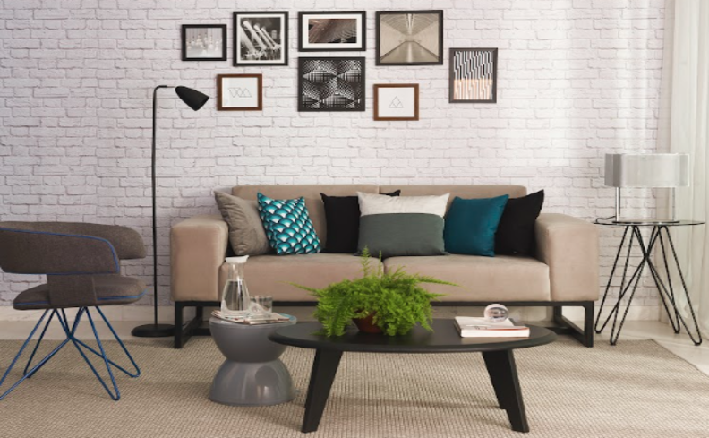 como decorar sofá com manta e almofadas, quadros e diversos itens de decoração de inverno